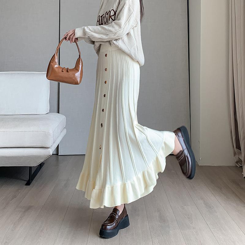 

Товста в’язана спідниця Жіноча довга спідниця Осінь/зима Корейська версія Тонка спідниця трапеції Однобортна дерев’яна спідниця з вушками One Size абрикосовий