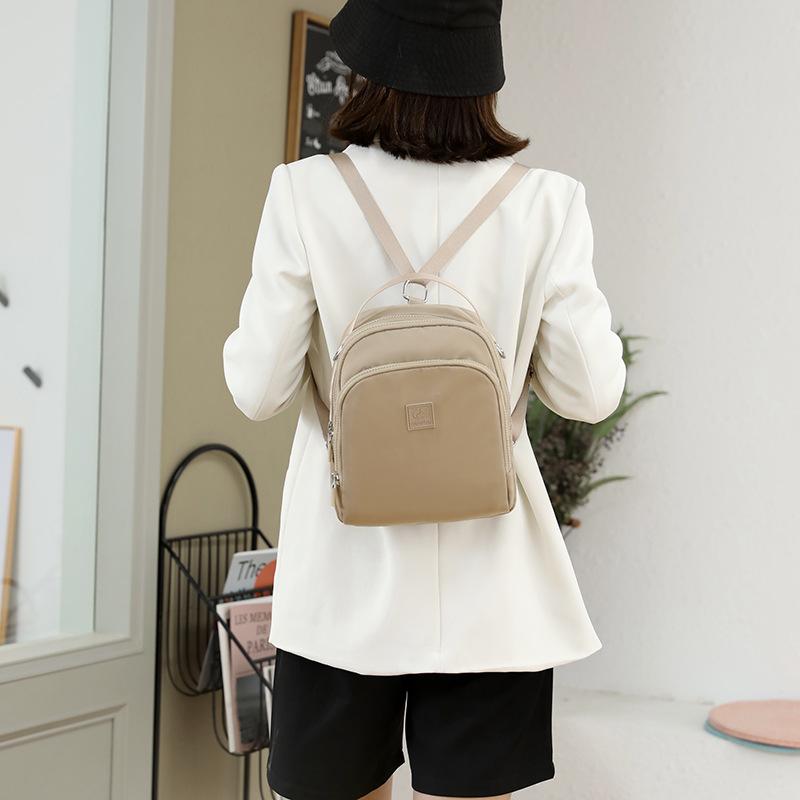 2025 new multi-functional women's backpack, waterproof nylon women's shoulder bag, large-capacity commuter messenger bag