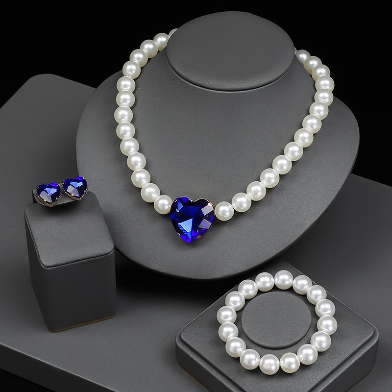 4pcs Haute Minimalist Bridal Set Euro-American Heart Zircon Plated Zircon Necklace Bracelet Earrings for Modern Weddings