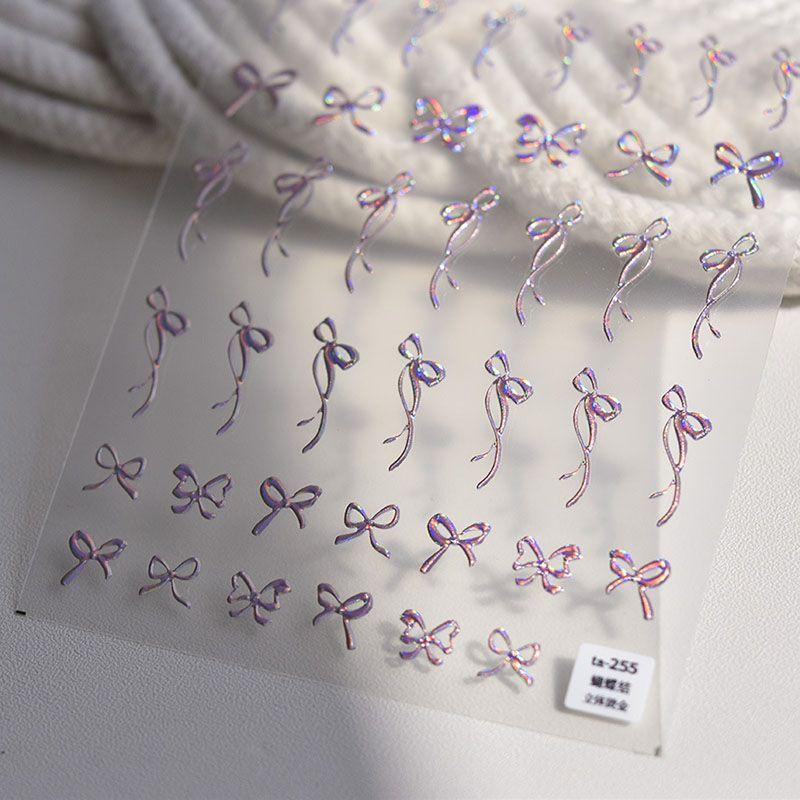 

Bronzing Silver Laser Powder Bows Nail Sticker Tomoni Adhesive 5D Cute Nail Sticker Nail Ornament Laser Powder Bows 255