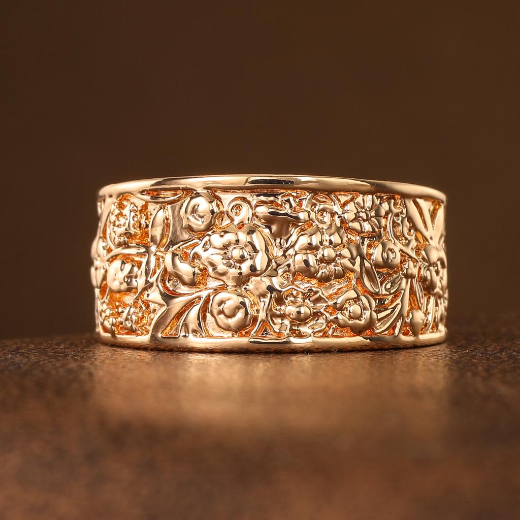 Retro-style relief flower-shaped ring made of copper, a ladies' jewelry item suitable for both formal events and daily wear.