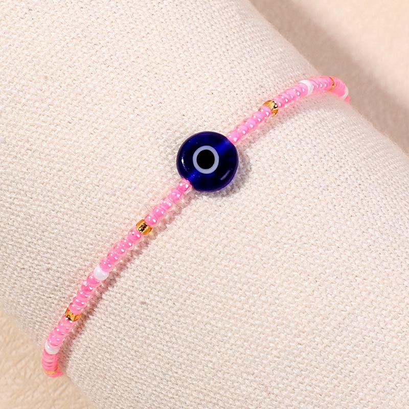 Bracelet en perles d'œil du diable tissé à la main avec motif de niche en verre