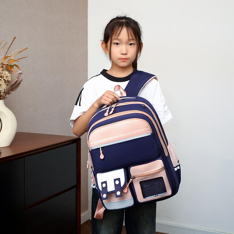 The New Color Matching Schoolbag for Primary School Students In Grades 1-6 Is Lightweight and Heavy-duty