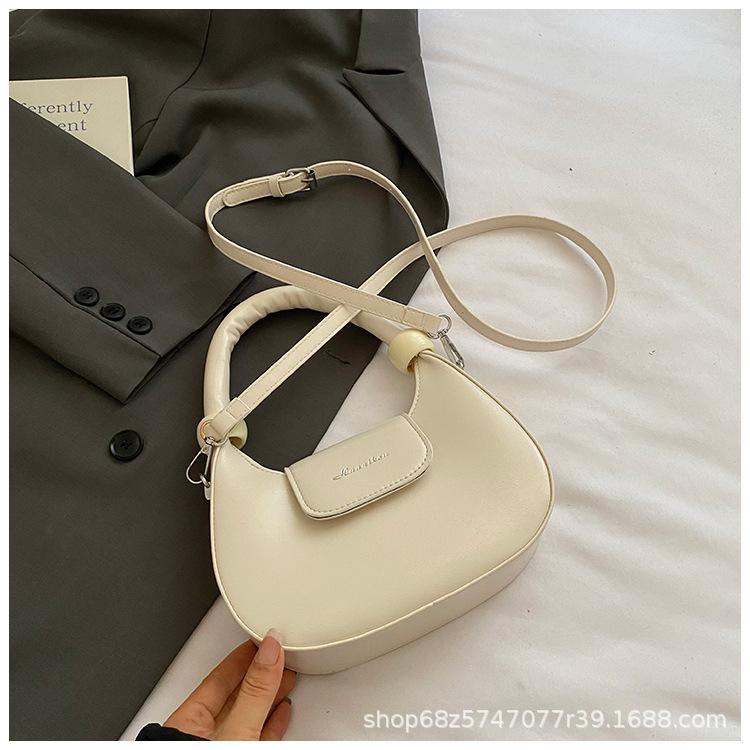

High-end niche hand-held crescent bag women s 2025 new commuter bag Korean version of fashion ins crossbody bag белый