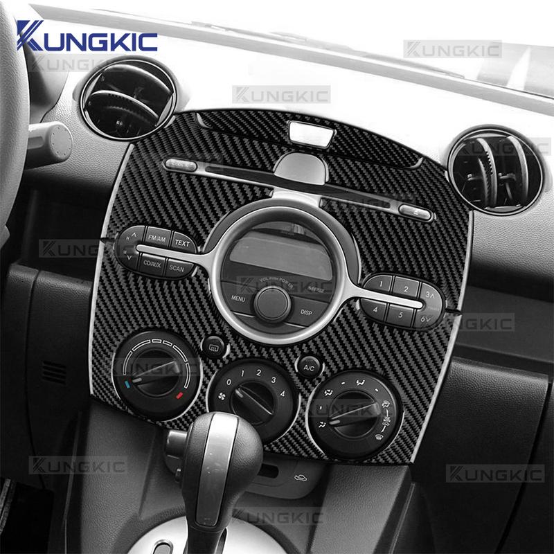 Vera Fibra di Carbonio Morbida Per Mazda 2 DE 2008 2009 2010 2011 2012 2013 2014 LHD RHD Adesivo Decorativo Cornice Pannello di Controllo Centrale per Auto.