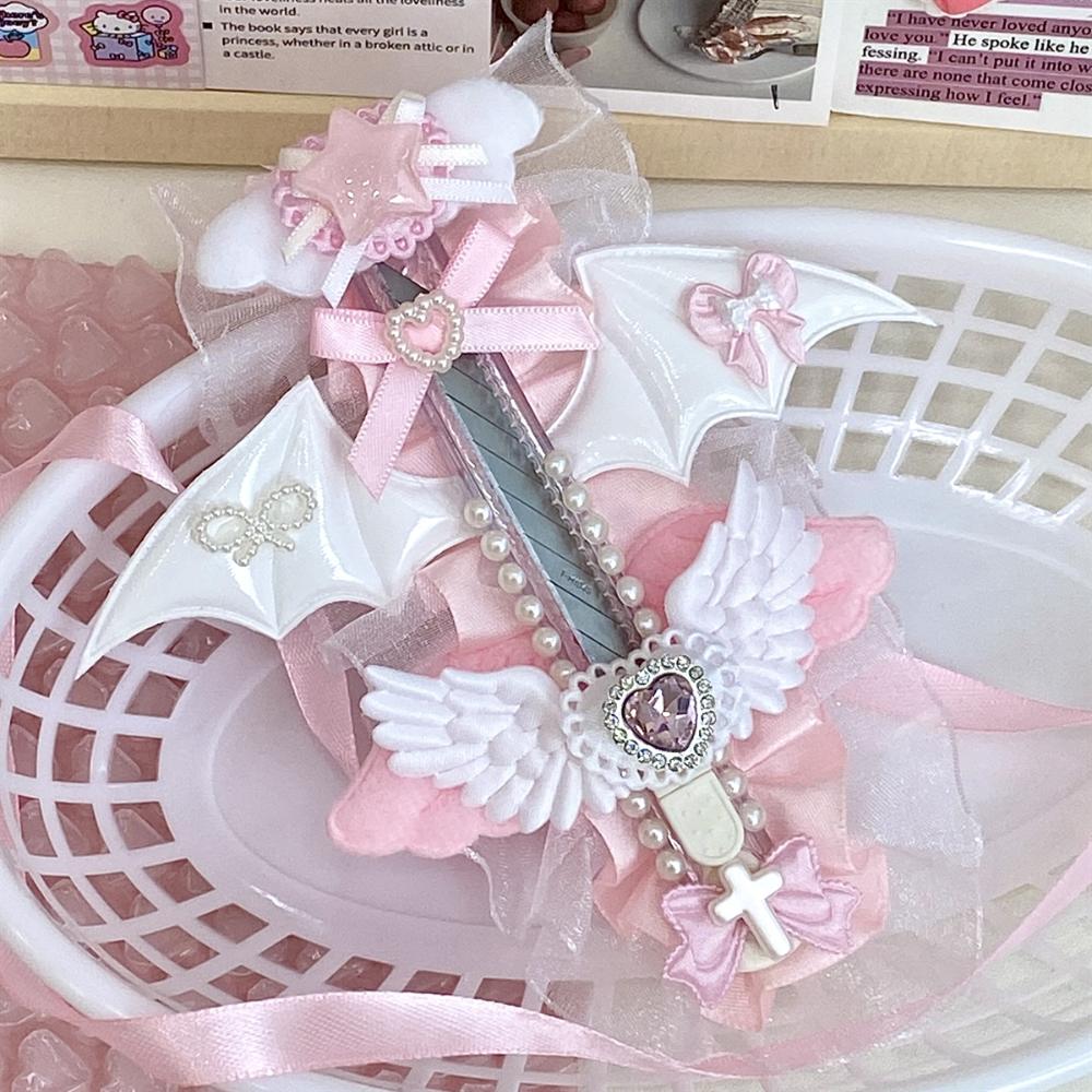 Carino rosa Zampa di Gatto Ali d'Angelo taglierino artistico Mini taglierino multiuso Apribuste retrattile Portatile Carino Apribuste Strumento per tagliare la carta
