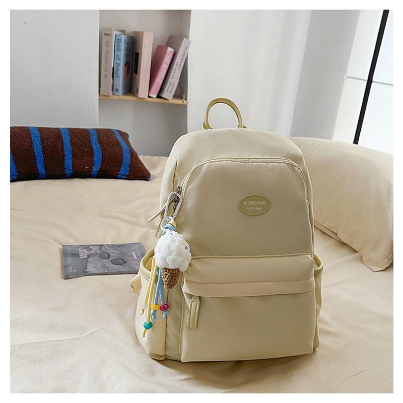 Fresh and sweet candy color backpack for junior high school students, solid color, simple and large-capacity backpack.