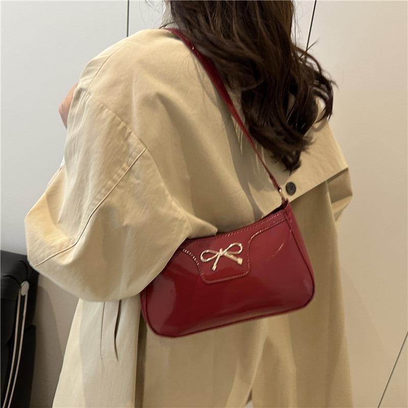 Fashion bow new personality trendy texture commuter underarm shoulder bag women