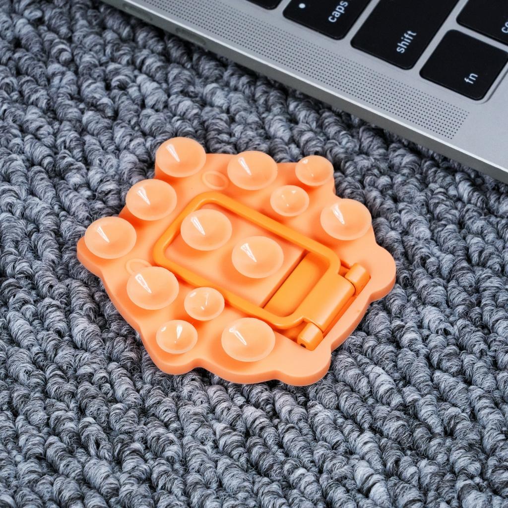 Hexagonal silicone suction cup mobile phone holder, lazy artifact, portable magnetic suction multi-function universal folding desktop holder