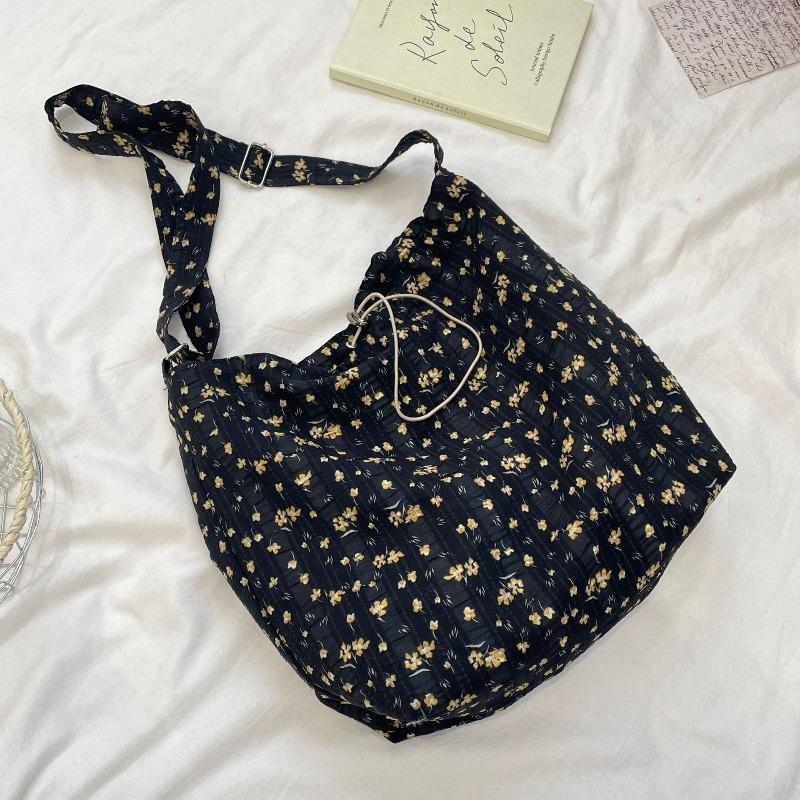 

3 niche broken flower canvas bag women s new large-capacity casual commuting shoulder messenger bag