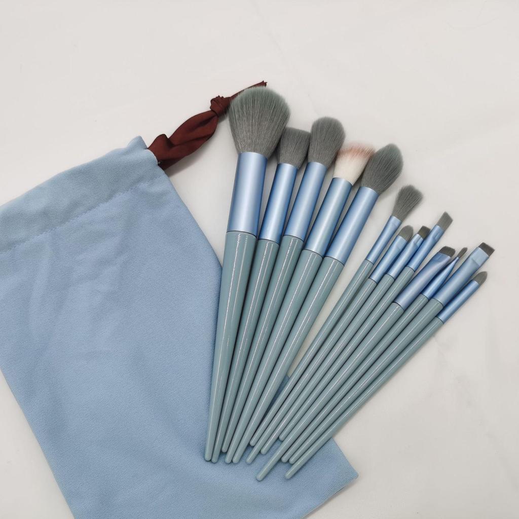 Portable 13-Piece Makeup Brush Set: Includes Loose Powder, Blush, Eyeshadow, and Lip Brushes with Storage for Complete Makeup Tools.