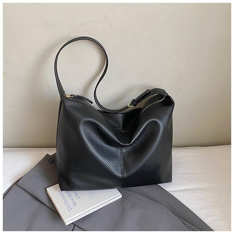 Korean version of foreign style texture bag women's 2025 new large-capacity casual shoulder messenger bag fashionable solid color tote bag