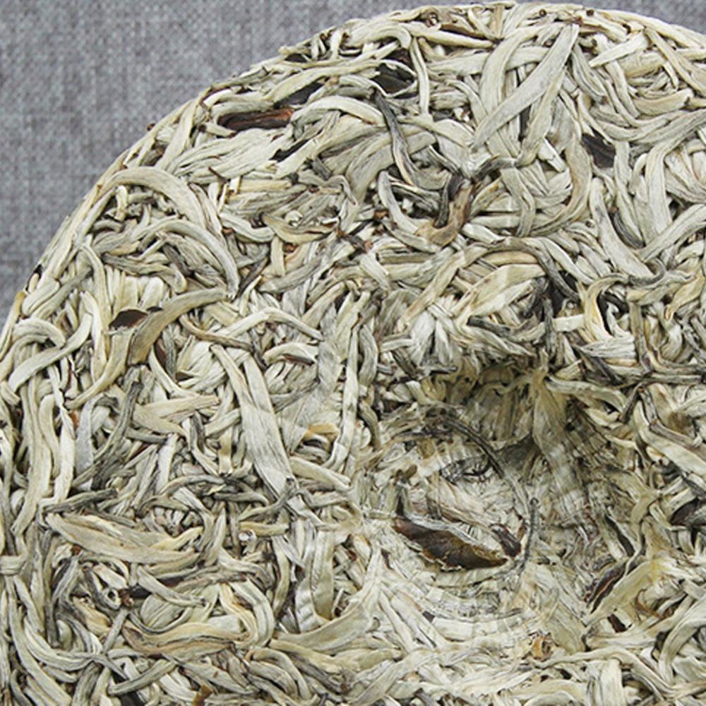 Stříbrná jehla Starý strom Bílý čaj Jediný pupen Pu erh Zdravotní péče