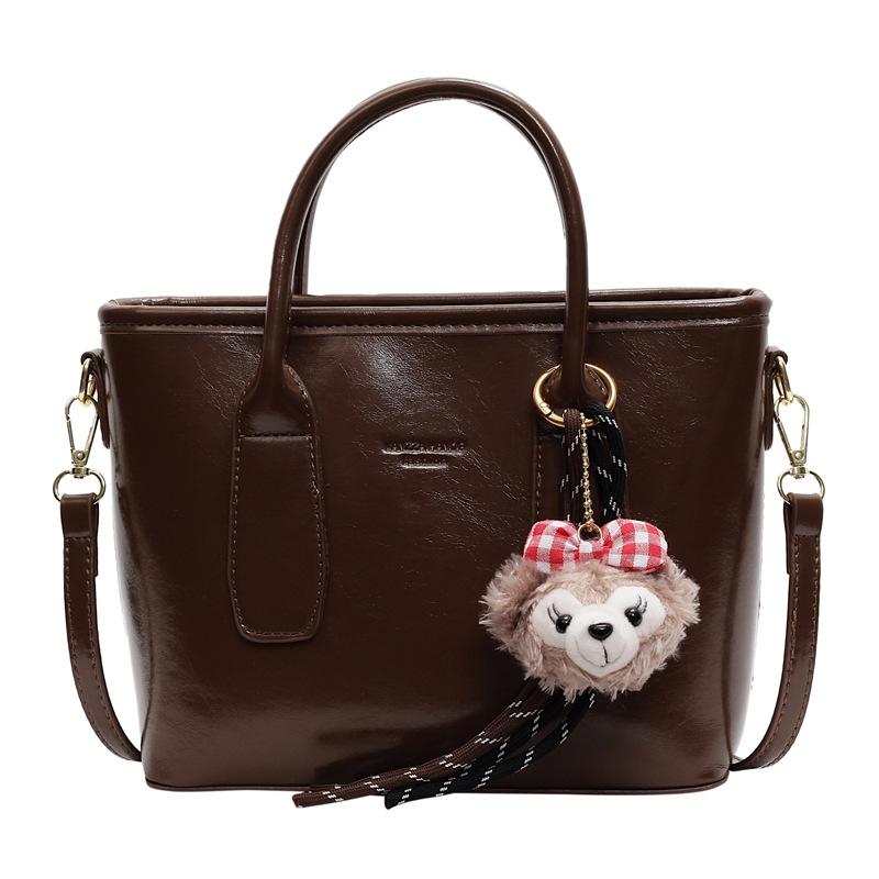 Simple and fashionable handbag spring new retro texture bucket bag solid color commuter shoulder messenger bag