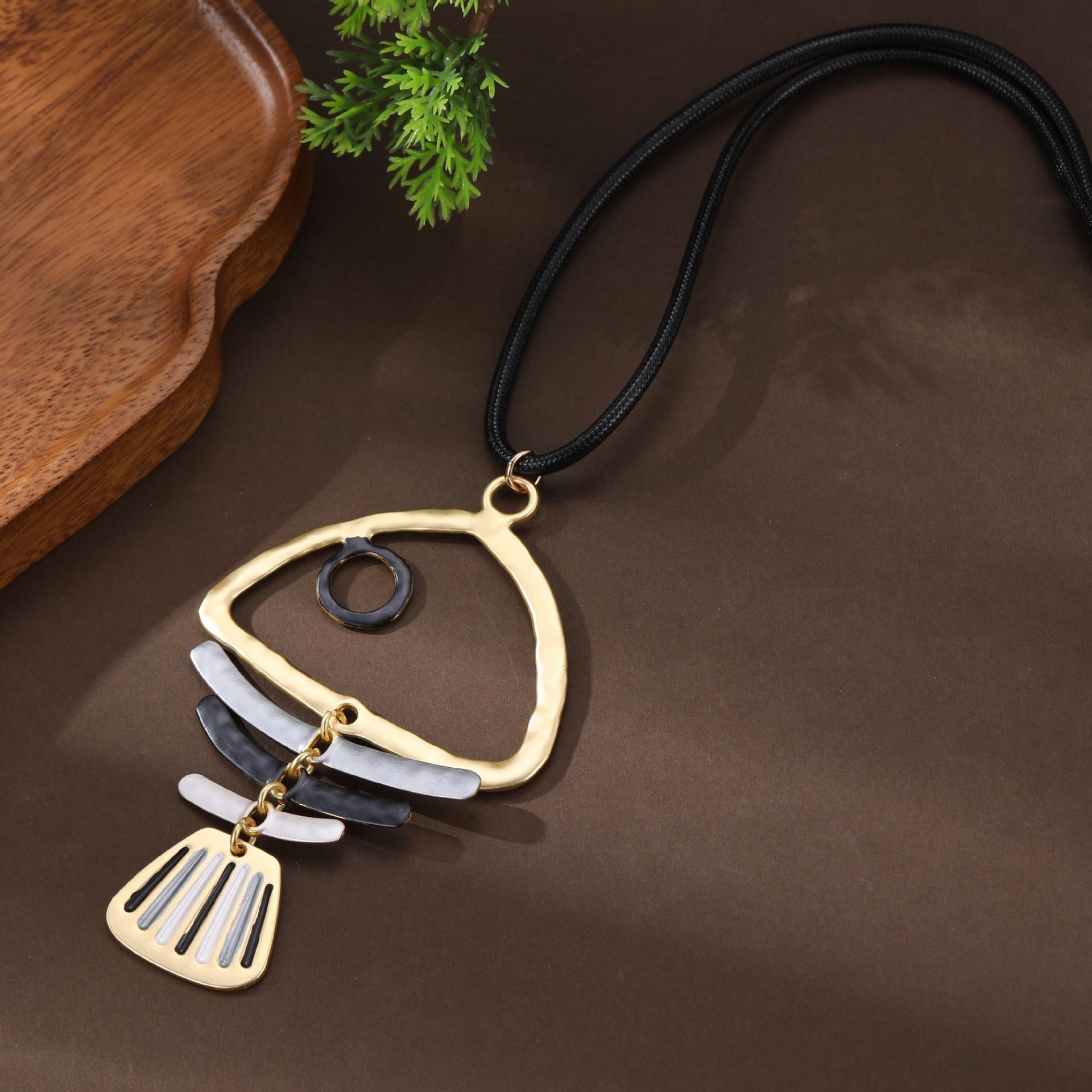 

Новая эмалевая цветная полая рыбья кость кожаная веревка длинная подвеска женская мода рыбья кость универсальное длинное ожерелье