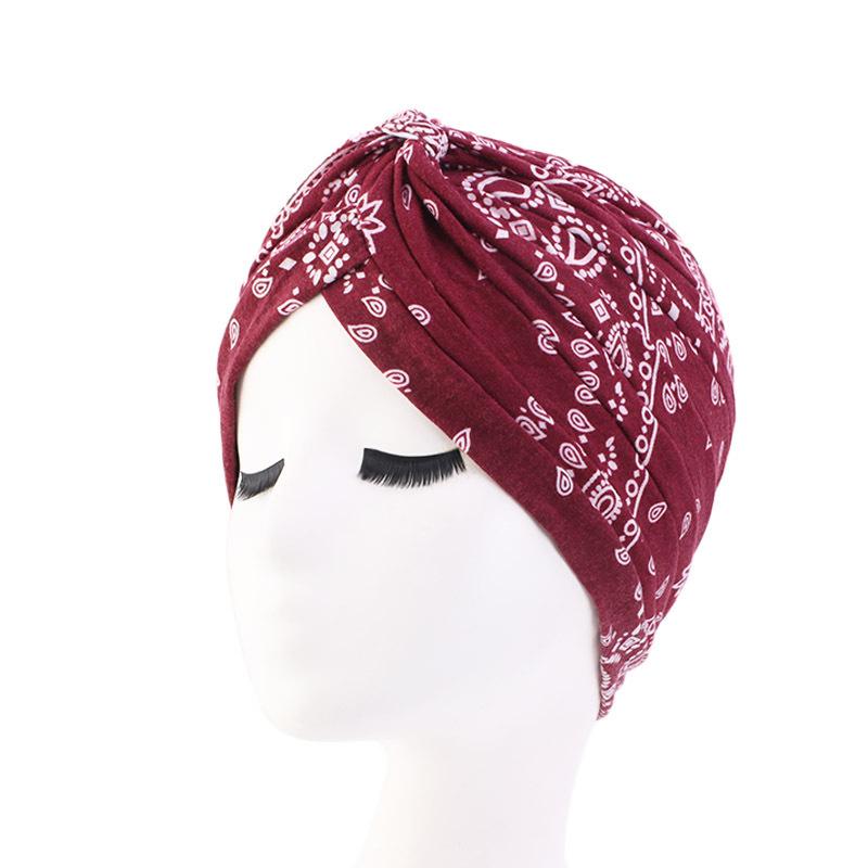 Turbanmütze für Damen mit Leoparden- und Schlangenhaut-Blumendruck und Knoten
