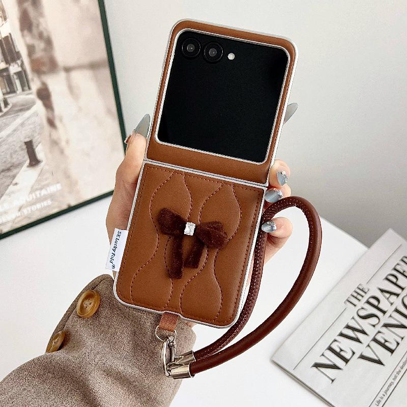Fashionable Bowknot Motorola Razr60 Drop-proof Foldable Phone Case with Anti-lost Rope.