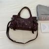 Motorcycle-style Bag with A Lady's Crossbody Strap for Commuting, A Shoulder Bag, and A Tote Bag.