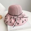 Hat women's spring and summer new bow knitted empty top hat vinyl sunscreen beach sunshade printing folding sun hat