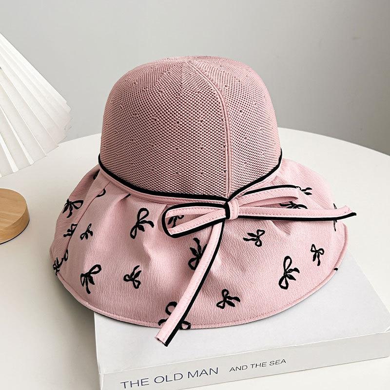 Hat women's spring and summer new bow knitted empty top hat vinyl sunscreen beach sunshade printing folding sun hat