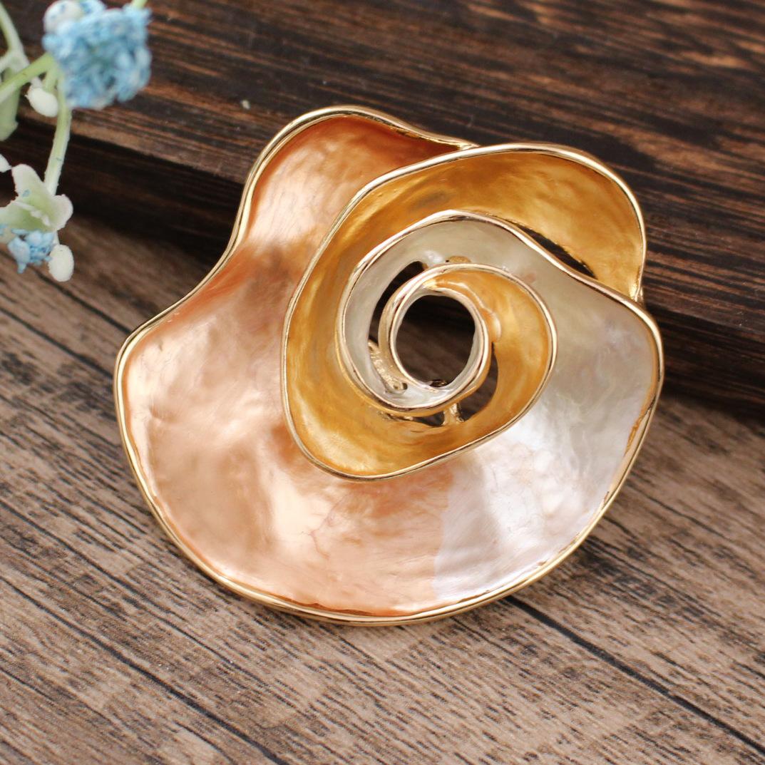 

Enamel hollow geometric flower magnetic brooch, women s high sense versatile petal brooch