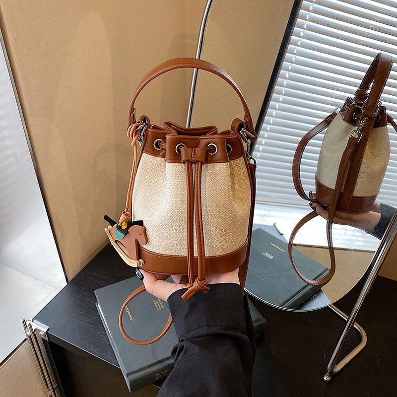 Niche bag women's new summer versatile messenger bag drawstring mini bucket bag