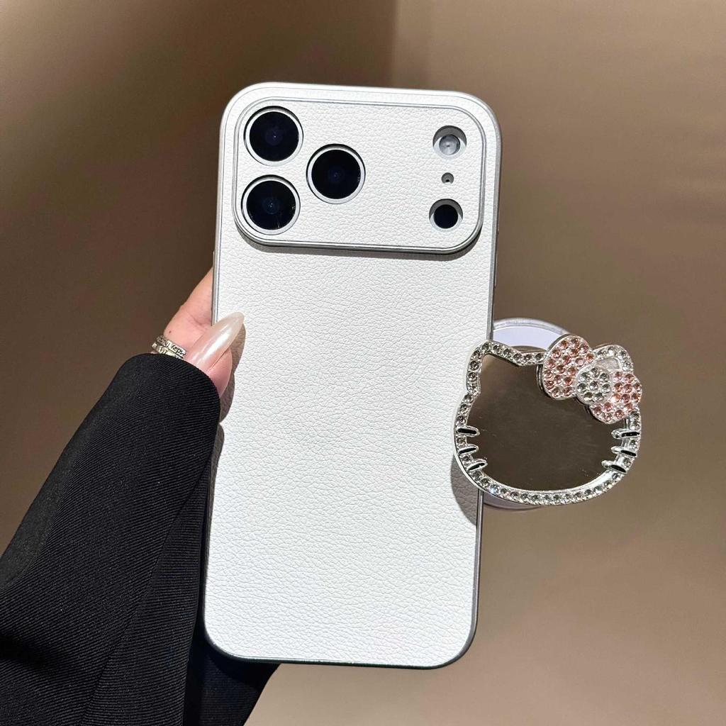 Premium Rhinestone KT Cat Mirror Phone Case for iPhone 17 Pro Max with Lychee Pattern and Magnetic Stand