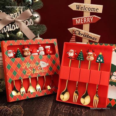 Weihnachts-Cartoon-Besteckset: Gabeln, Löffel und Geschenkbox mit niedlichen Rentier- und Baumdesigns.