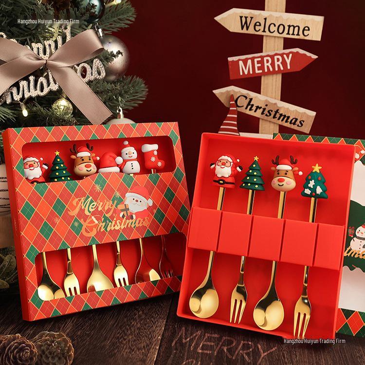 Christmas Cartoon Cutlery Set: Forks, Spoons, and Gift Box Featuring Cute Reindeer and Tree Designs.