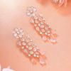 Estele Designer Rose Gold Earrings with Shiny CZ Streamers and Mint Pink Stones for Women