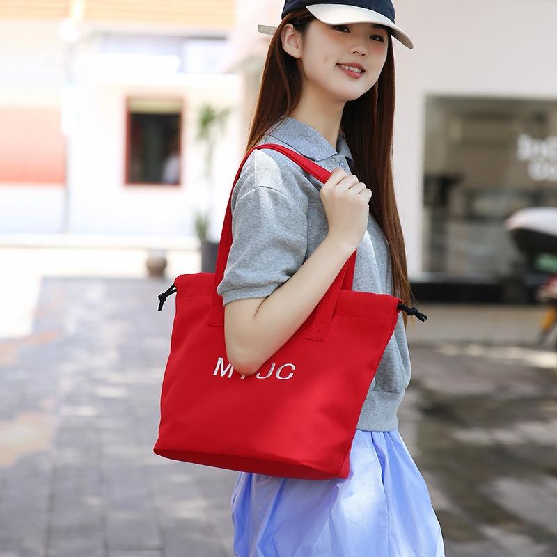 Large-capacity bag women's new summer versatile shoulder bag drawstring lazy wind college student class bag