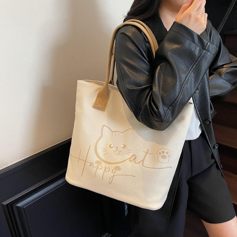 Large Capacity Tote Bag 2025 Autumn New Korean Version of Fashion Niche Cartoon Canvas Bag Casual Commuter Shoulder Bag