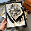 Xiaoxiangfeng new foreign air magnetic buckle scarf high-end triangular scarf versatile neck protection scarf printed windproof square scarf