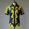 Short-sleeve linen shirt with vintage ornate floral print, casual wear.