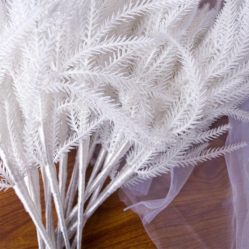 A White Halloween Home Decoration Piece Made of Simulated Artificial Plastic Norfolk Pine Needles