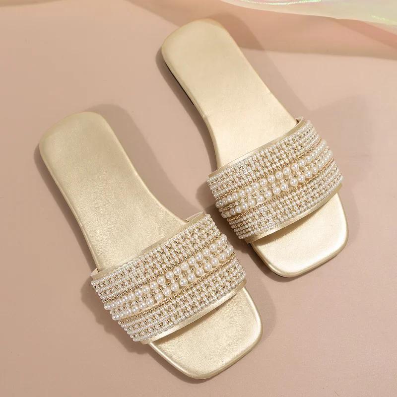 Modne damskie płaskie kapcie 2025 lato nowe modne plażowe antypoślizgowe sandały na zewnątrz perłowe luksusowej marki designerskie buty Zapatos De Mujer