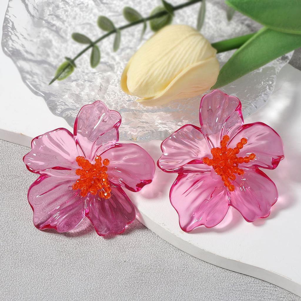 Exaggerated, individualistic, trendy and fashionable acrylic transparent flower stud earrings are versatile and stylish for street style