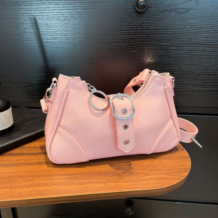 

Rivet armpit bag women s shoulder messenger bag рожевий