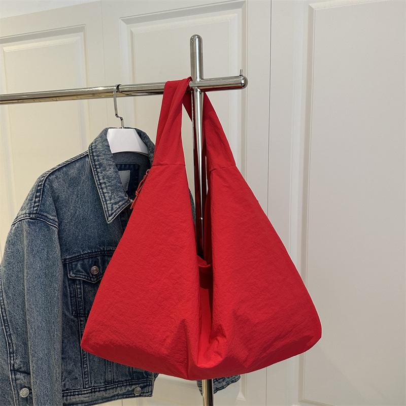 

Large capacity tote bag women s autumn new lightweight armpit bag large capacity fashionable versatile commuter shoulder bag