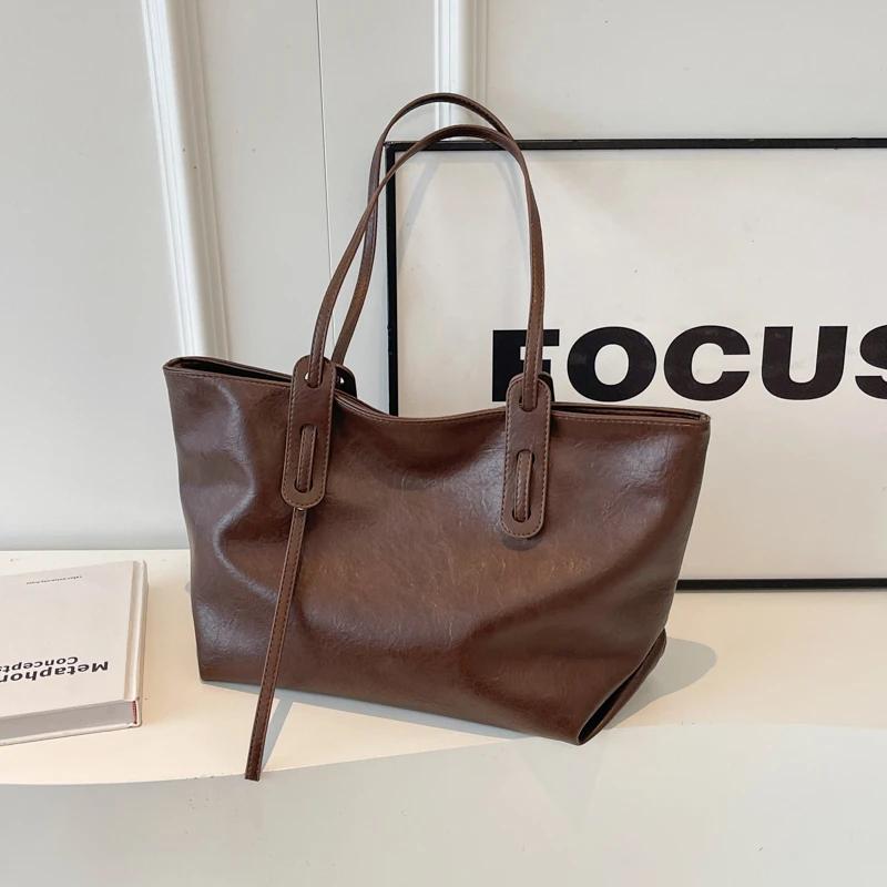 PU Einfarbig Hochwertige Damen-Einkaufstasche Hohe Schönheit Reißverschluss Vielseitige Mode-Umhängetasche Weiche Einfache Beliebte Handtasche