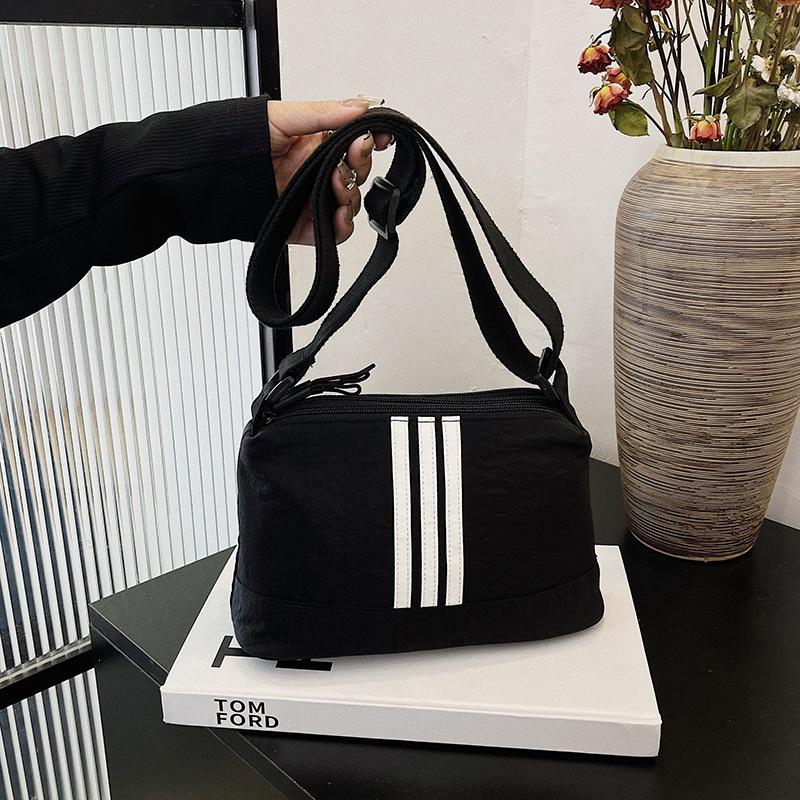 Korean version of simple trend multi-layer nylon women's bag casual fashion versatile shoulder messenger bag large capacity dumpling bag