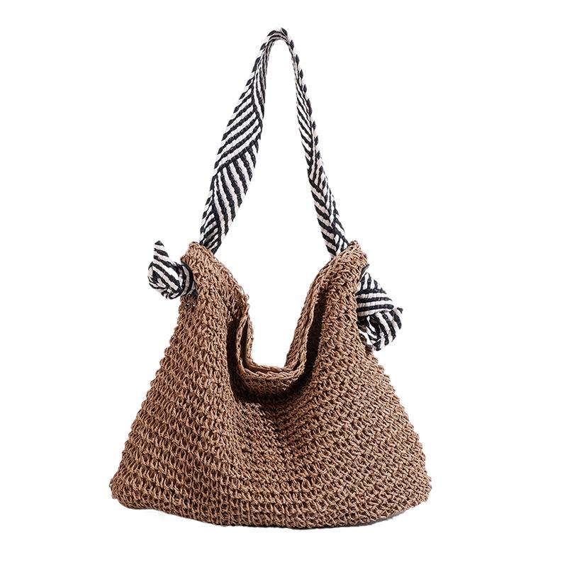 

Holiday Style Straw Woven Bag: Large Capacity, Trendy Single Shoulder with Personalized Strap for Women