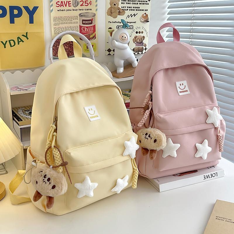 Cute Pink Backpack for Girls Fashionable Star Decorated School Bag with Plush Charm Ideal for Daily Use and School Cute Style Ba