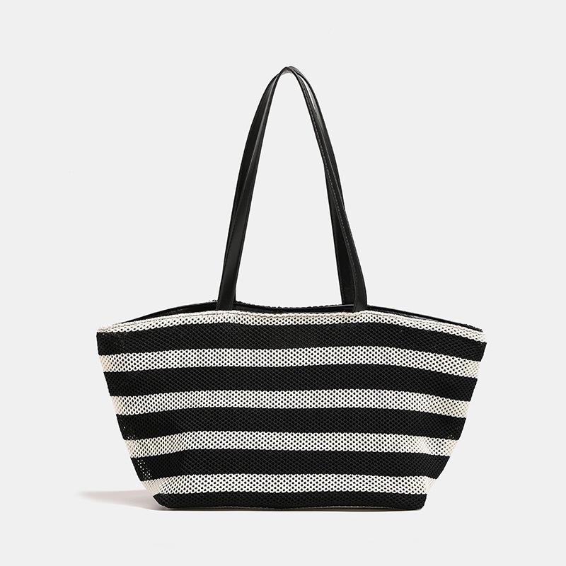 Korean-style large-capacity hollow woven tote bag, large-capacity casual and relaxed shoulder bag, new summer handbag