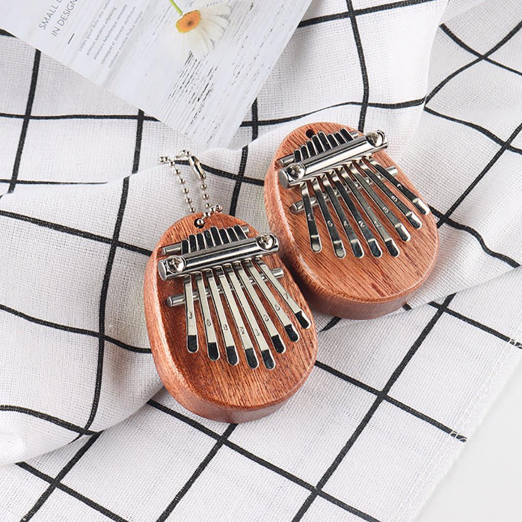 portatile Kalimba pianoforte con cordini regalo di Natale per la famiglia Mini pianoforte a 8 tasti con mini pollice Kalimba