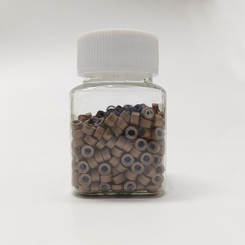 

Бесшовное кольцо для наращивания волос с силиконовой ручкой и золотой проволокой 500 pieces bottled