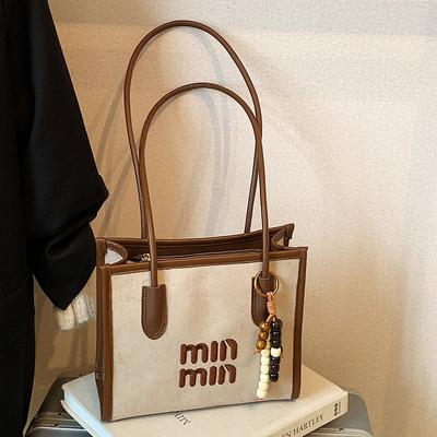 Herbst neue einfache Handtasche Damen Nischen Beuteltasche Hoher Wert Umhängetasche Tägliche Pendler Umhängetasche