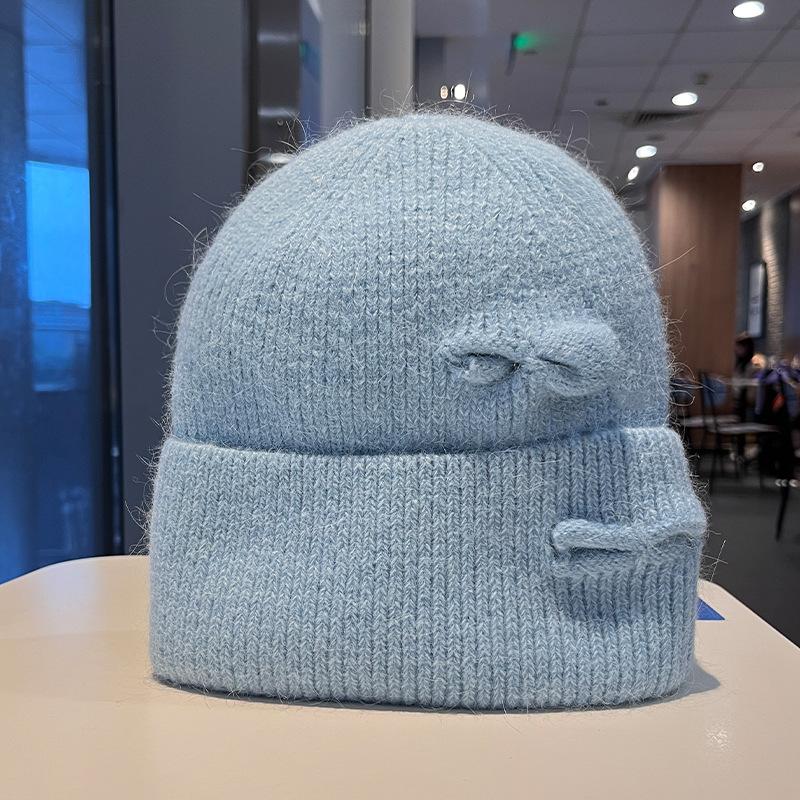 Korean version of fashion hole knitted wool hat men and women autumn and winter outdoor warm bag head cold hat lazy knitted hat