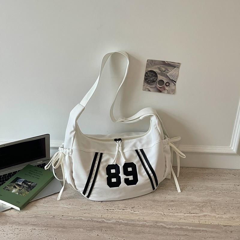 Fashionable and Unique Striped Bag for Holding Dumplings, A Casual Crossbody Bag with An Angle-hung Design At The Armpit.