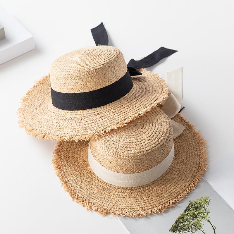 Korean version of elegant flat-top raffia straw hat for women's summer small fresh bow holiday beach big-brimmed sun hat